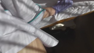 Nurse examines dick